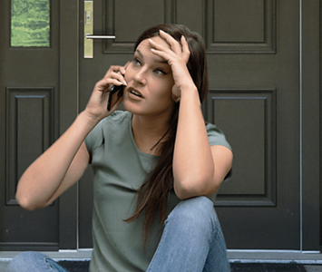 Woman calling Lock & Key Rotherham for help after finding herself locked out